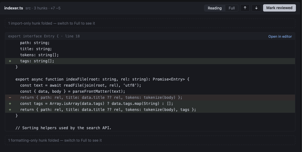 Reading mode: one import-only hunk and one formatting-only hunk folded, leaving only the change that adds tags to the Entry type and to indexFile.